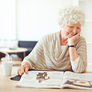 Senior woman reading a magazine